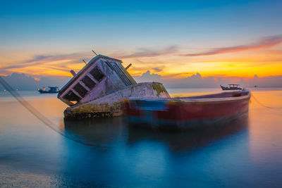 Scenic view of sea against sky during sunset