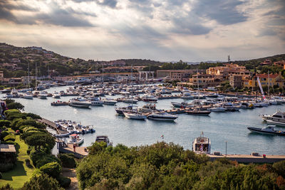 Boats moored at harbor