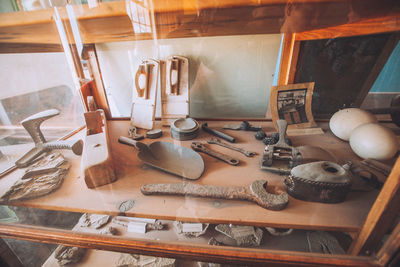 High angle view of old tools on table