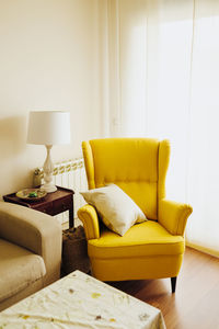 Yellow armchair interior design living room
