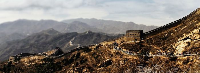 Panoramic view of historic building against cloudy sky