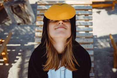 Portrait of woman wearing hat