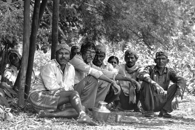 Group of people sitting outdoors