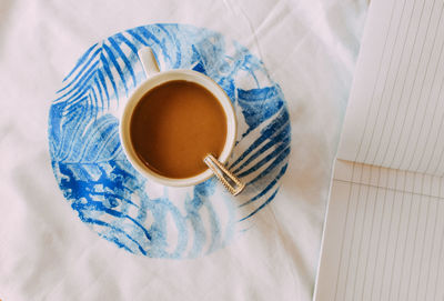 High angle view of coffee cup on table