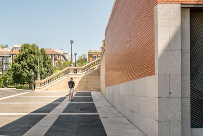 Rear view of man standing at museo nacional del prado