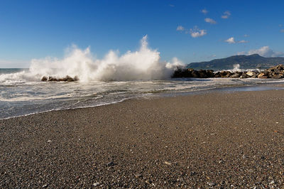 Scenic view of beach against sky