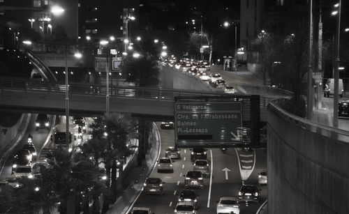 Cars in a retention at night on an entrance motorway to the city of barcelona