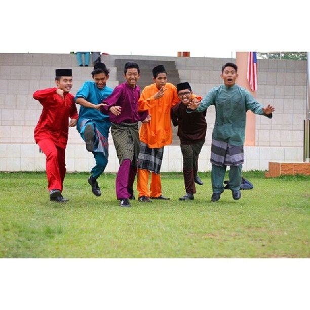 lifestyles, togetherness, leisure activity, bonding, friendship, casual clothing, love, full length, grass, transfer print, men, boys, childhood, young men, person, enjoyment, playing, happiness