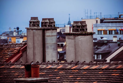 View of roof tiles against clear sky