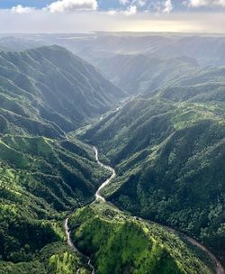 Aerial view of valley against sky