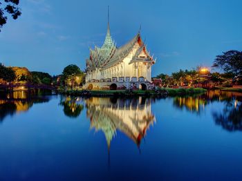 Sanphet prasat palace by river against blue sky