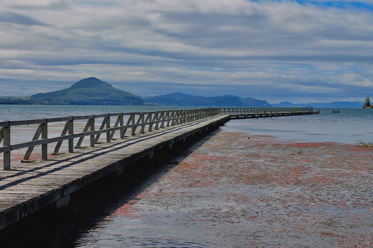 BRIDGE OVER SEA AGAINST SKY