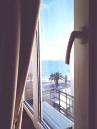 Scenic view of sea seen through window