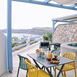 Breakfast served on dining table at building terrace