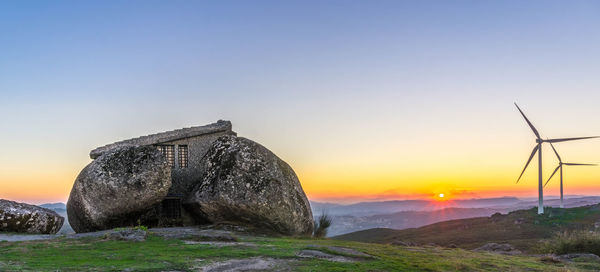 Scenic view of landscape against sky during sunset