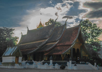 Group of people in temple against building