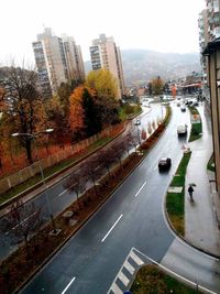 High angle view of city street against sky