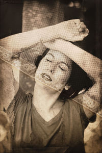 Close-up portrait of girl wearing hat