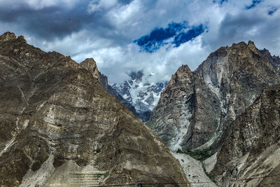 Low angle view of rocks against sky