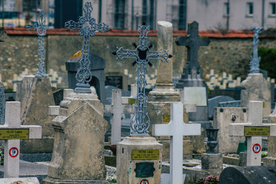 View of cemetery against built structure