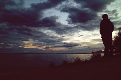 Scenic view of sea against cloudy sky