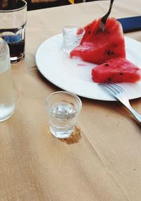 High angle view of drink in glass on table