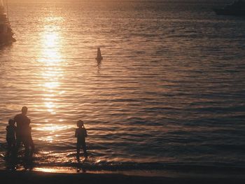 Scenic view of sea at sunset