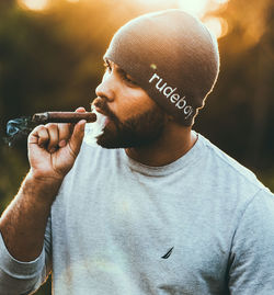 Midsection of man holding ice cream