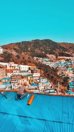 High angle view of man working on roof