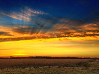 Scenic view of landscape at sunset