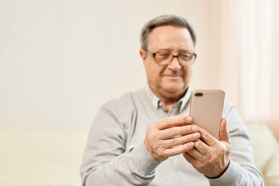 Young man using mobile phone