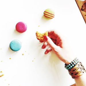 Cropped image of person holding hands