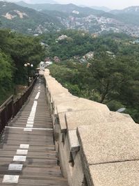 High angle view of staircase amidst buildings