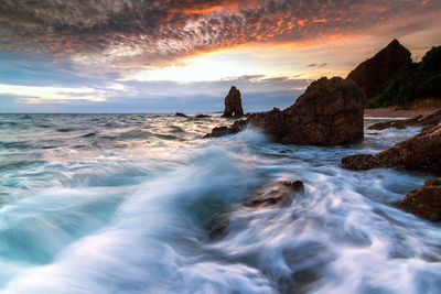 Scenic view of sea against sky during sunset