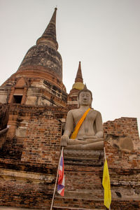 Low angle view of traditional building against clear sky