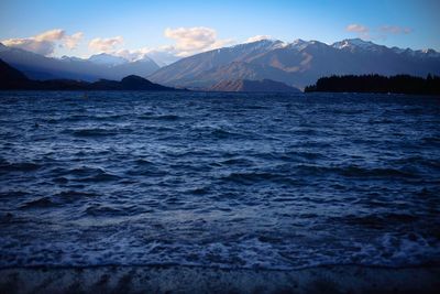 Scenic view of sea against sky at sunset