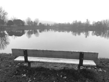 Empty pier on calm lake