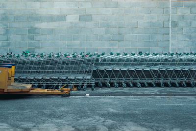 Empty chairs against wall
