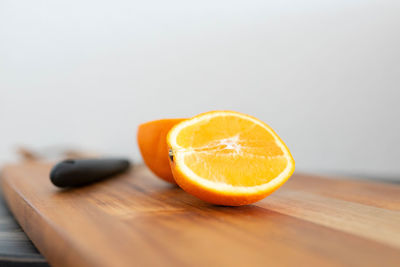 Orange slice on cutting board