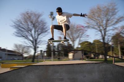 Full length of man jumping in park