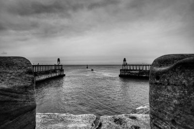 Pier on sea against sky