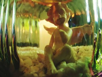Portrait of man in aquarium at home
