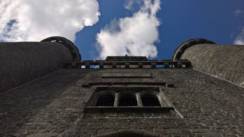 Low angle view of historic building against sky