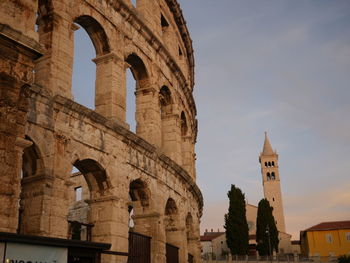 Low angle view of historical building against sky