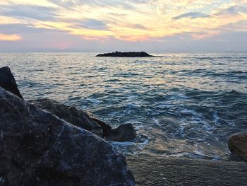 Scenic view of sea against sky during sunset