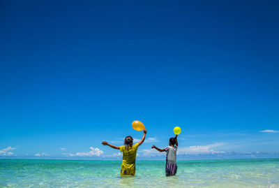 Boy playing on beach