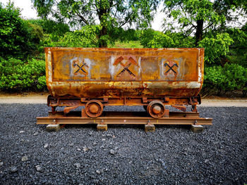 Old vintage car on railroad track