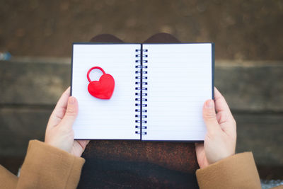 Close-up of hands holding heart shape