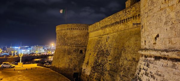 Buildings in city at night