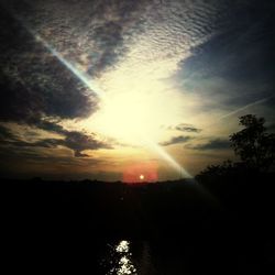 Scenic view of sunset over river
